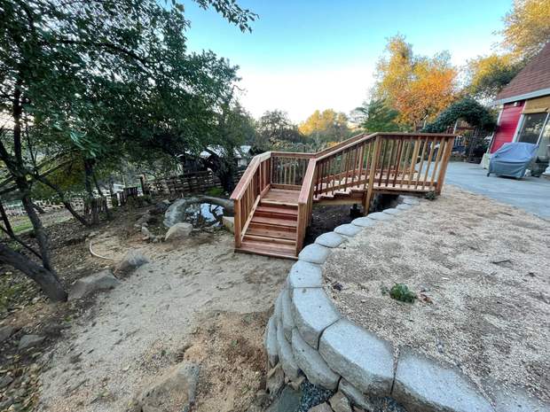 Redwood hillside stairs with block retaining wall